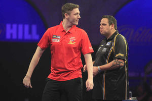 Shropshire's David Pallett, left, in action against Adrian Lewis during the PDC World Championship