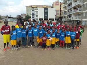 Youngsters wearing their kits after a donation trip to Kenya.