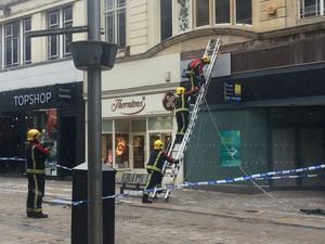 Supporting image for story: Busy Wolverhampton street cordoned off by police after shop front comes loose