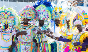 Colourful costumes as people perform a Junkanoo in the Bahamas