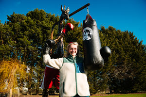 Alice Langford with the giraffe sculpture