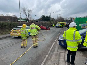 Fire crews were called out to make the vehicles safe. Picture: James Lewis