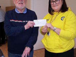 Supporting image for story: Support group donates £450 to Marie Curie
