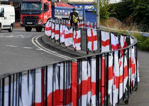 The flags are also placed on the railings surrounding the roundabout 