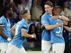 Scott McTominay hugs a Napoli team-mate to celebrate scoring