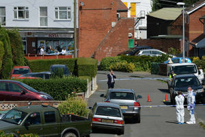 Forensic officers at an address in Meadow Close after the tragedy