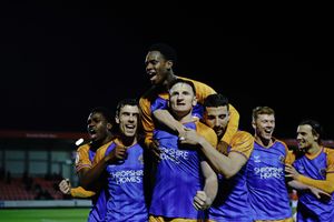 Will Boyle celebrates scoring Shrewsbury Town's winner at Salford City