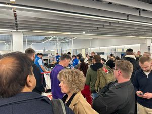 Hundreds of passangers were left stranded as they waited around three hours to be let onto their planes