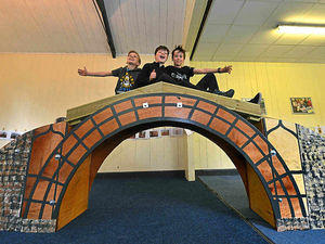 Supporting image for story: Pupils show teamwork to build model Iron Bridge in hostel activity day