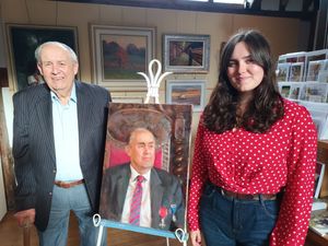 Milner Whiteman OBE at the unveiling of his portrait with his granddaughter, Much Wenlock Town Council's youngest elected member Cllr Daisy Whiteman.