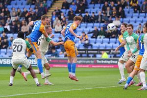 Will Boyle of Shrewsbury Town scores a goal to make it 2-0