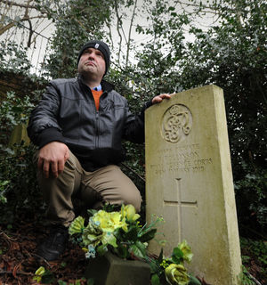 Paul Rhodes, next to one of the war graves.