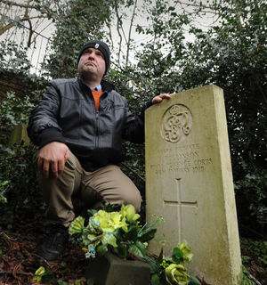 Paul Rhodes, next to one of the war graves.