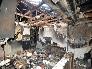 Supporting image for story: New photos show fire-ravaged bungalow as owner's family thank neighbours for support