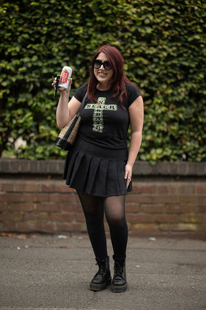 Music fan Ellie Robinson arrives to attend British rock band Black Sabbath's "Back to The Beginning" concert, Ozzy Osbourne's final ever gig as Black Sabbath's frontman at Villa Park in Birmingham, central England on July 5, 2025. Osbourne, who revealed in 2020 that he has Parkinson's disease, will join Tony Iommi, Geezer Butler and Bill Ward for the all-day "Back To The Beginning" show in Birmingham, central England, where the heavy metal giants formed in 1968. (Photo by Oli SCARFF / AFP) (Photo by OLI SCARFF/AFP via Getty Images)          