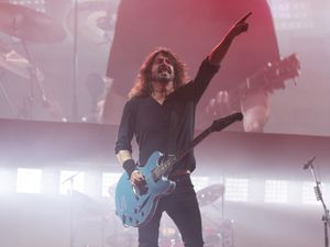 Supporting image for story: Dave Grohl discusses rift with father over career in music
