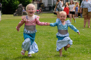 Marvellous mermaids Milli Thomas, three, and Elizabeth Davies, two, couldn’t wait to try out all the attractions at the carnival. Andy Compton image