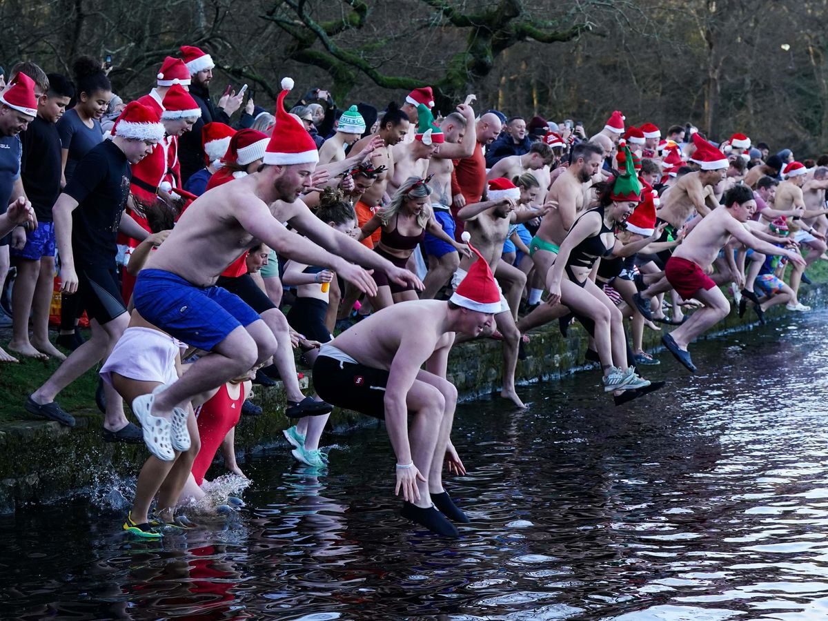 In Pictures: Hardy swimmers and royal watchers brave cold Christmas Day