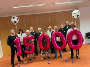 Supporting image for story: Fundraisers hit the back of the net with £15,000 donation for Wolverhampton-based sight loss charity