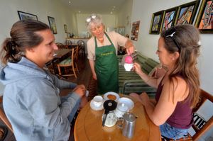 Jill Kirk serving Helena Lea-Atkins and Karen Nicholls
