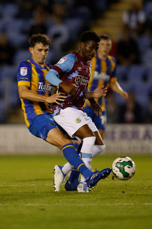 Tom Flanagan of Shrewsbury Town and Nathan Tella of Burnley (AMA)