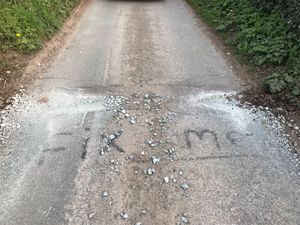 Supporting image for story: 'Fix Me': Message to Shropshire highways team after drain collapse  