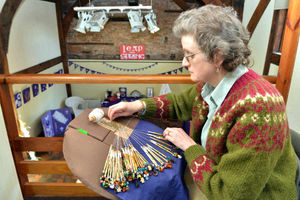 Mary Steer, from Sutton Farm, demonstrates lace making