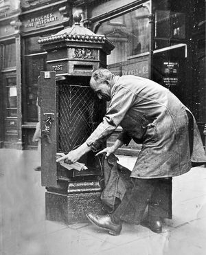 Emptying the postbox on The Square, Shrewsbury, 1948