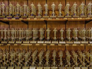 Rows of replica Oscar statuettes in a gift shop in Los Angeles, California