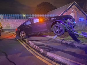 Supporting image for story: Car left stranded in mid-air after hitting lamppost 
