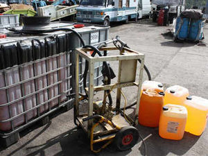 Supporting image for story: Arrests after kerosene found in raid