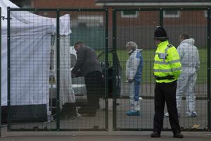 Forensics teams search the area