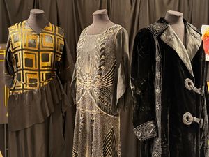 The Georgette evening dress (centre) featured at the exhibition.
