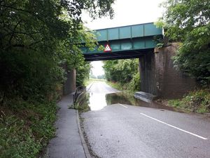 Supporting image for story: Car dragged out of flood near Albrighton