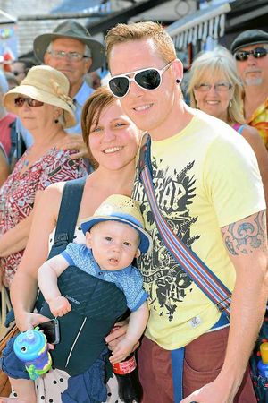 Susie Davies, Rich Knights and Archie Knights watch the parade