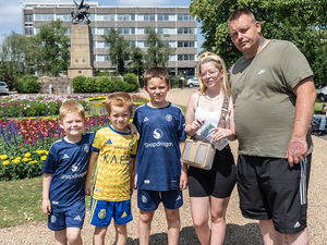 Revellers enjoy the annual duck race in Stafford.