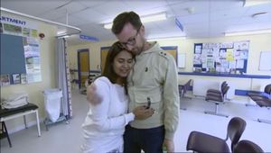 Satnam, left, being comforted at the hospital