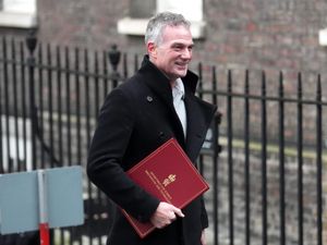 Technology Secretary Peter Kyle waking along Downing Street