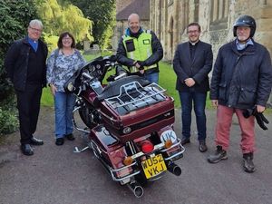 Supporting image for story: Bishop rides his Harley-Davidson for annual churches event