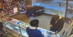 The iPhone 6 is given a once over by the man seen on CCTV