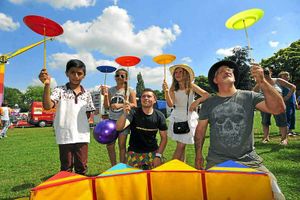 Youngsters try their hand at plate-spinning at the West Park event