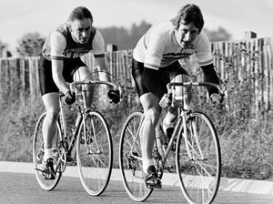 Mick, left, cycling with road-race champion Keith Lambert in 1980