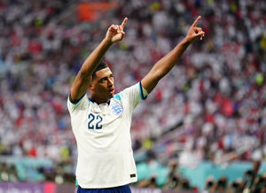 England's Jude Bellingham celebrates scoring their side's first goal of the game during the FIFA World Cup Group B match at the Khalifa International Stadium, Doha. Picture date: Monday November 21, 2022. PA Photo. See PA story WORLDCUP England. Photo credit should read: Mike Egerton/PA Wire...RESTRICTIONS: Use subject to restrictions. Editorial use only, no commercial use without prior consent from rights holder..