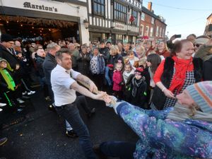 Supporting image for story: Shropshire town's festive tug-of-war contest has new winner for first time in five years