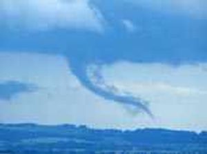 "It started to build up and reach towards the ground so we stopped the car and my brother took pictures on his mobile.