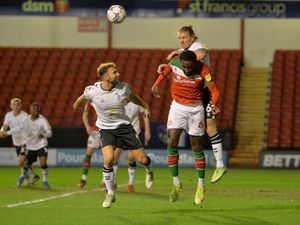 Supporting image for story: Michael Flynn pleased with form of Walsall's 'friendly giant' Manny Monthe