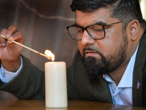 Supporting image for story: Service helps remember genocide victims