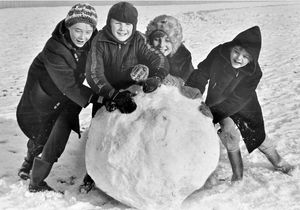 January 4, 1977: Taking a last chance to make the biggest snowball in Sandwell before going back to school after the holidays are, from left, Ruth Phillips, aged 11, Paul Dyke, aged seven, Julie Dyke, 10, and Rachael Phillips, aged nine years.