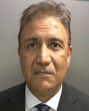 Rathore's police mugshot