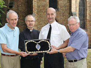 Supporting image for story: Stolen civic chain back at church